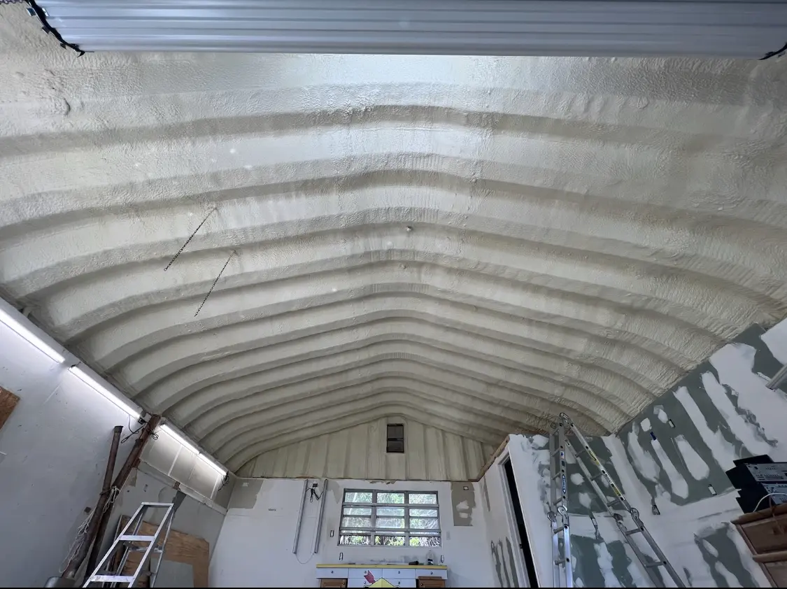 Spray polyurethane foam applied to the underside of a metal roof deck in Bardstown